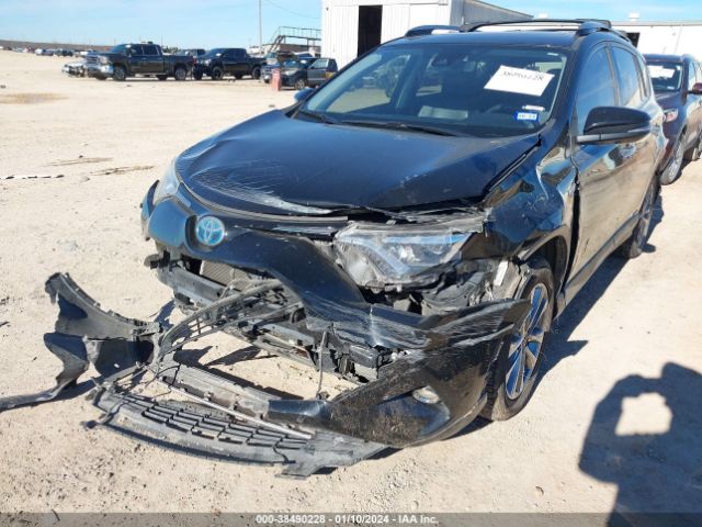 Photo 5 VIN: JTMDJREVXJD207979 - TOYOTA RAV4 HYBRID 