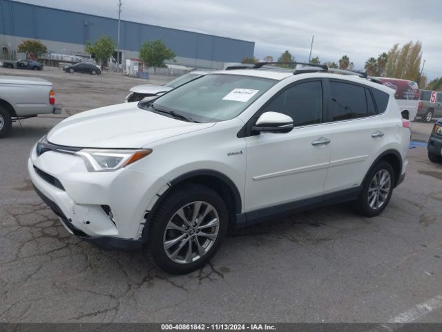 Photo 1 VIN: JTMDJREVXJD212390 - TOYOTA RAV4 