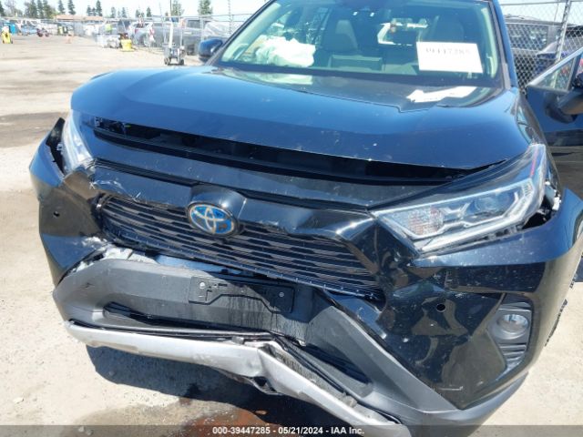 Photo 5 VIN: JTMDWRFV0KD521268 - TOYOTA RAV4 HYBRID 