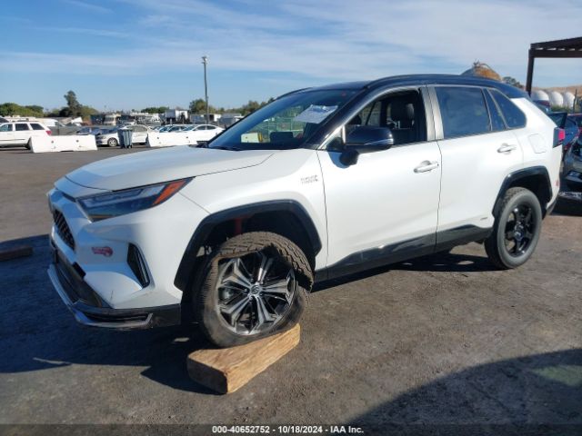 Photo 1 VIN: JTMEB3FV2PD128215 - TOYOTA RAV4 PRIME 