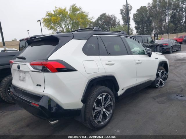 Photo 3 VIN: JTMEB3FV7ND100620 - TOYOTA RAV4 PRIME 