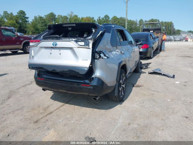 Photo 3 VIN: JTMFB3FV1MD043057 - TOYOTA RAV4 PRIME 