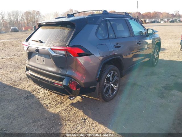 Photo 3 VIN: JTMFB3FV1PD141168 - TOYOTA RAV4 PRIME 