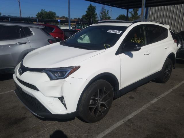 Photo 1 VIN: JTMJFREV0GD183544 - TOYOTA RAV4 SE 