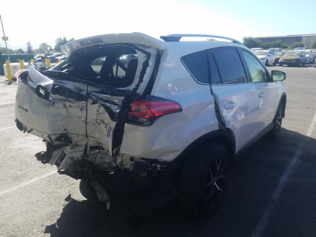 Photo 3 VIN: JTMJFREV0GD183544 - TOYOTA RAV4 SE 