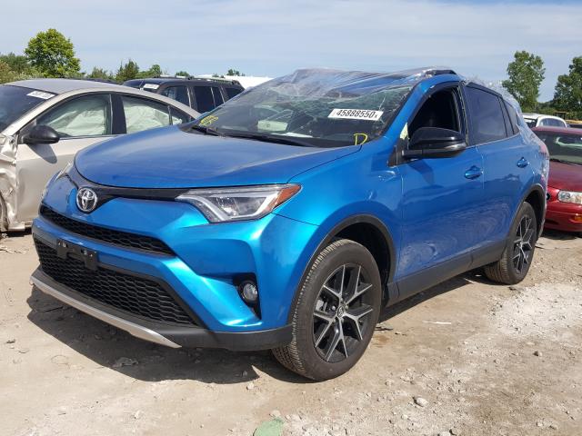 Photo 1 VIN: JTMJFREV1GD192799 - TOYOTA RAV4 SE 