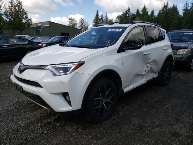 Photo 1 VIN: JTMJFREV1HJ711501 - TOYOTA RAV4 SE 