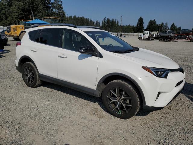 Photo 3 VIN: JTMJFREV1JJ205821 - TOYOTA RAV4 SE 