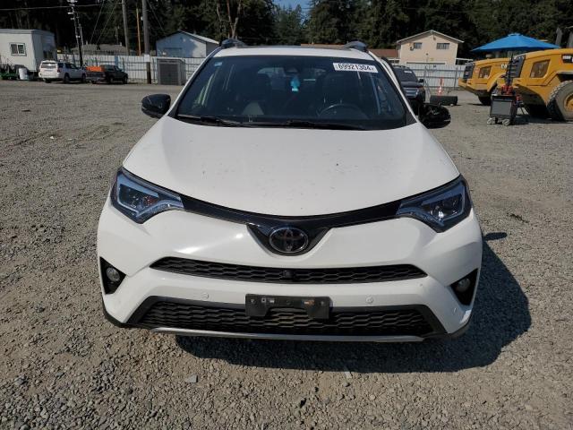 Photo 4 VIN: JTMJFREV1JJ205821 - TOYOTA RAV4 SE 