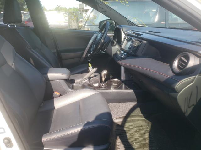 Photo 4 VIN: JTMJFREV2JJ748109 - TOYOTA RAV4 SE 