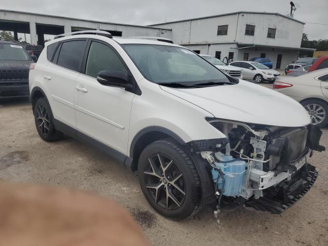 Photo 3 VIN: JTMJFREV4GJ055048 - TOYOTA RAV4 SE 