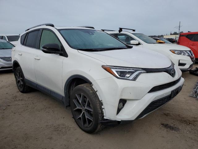 Photo 3 VIN: JTMJFREV4HD214750 - TOYOTA RAV4 SE 