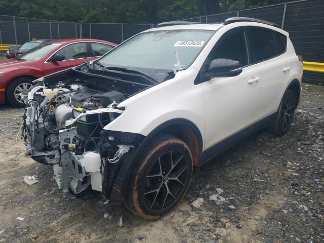 Photo 1 VIN: JTMJFREV4HJ701660 - TOYOTA RAV4 SE 