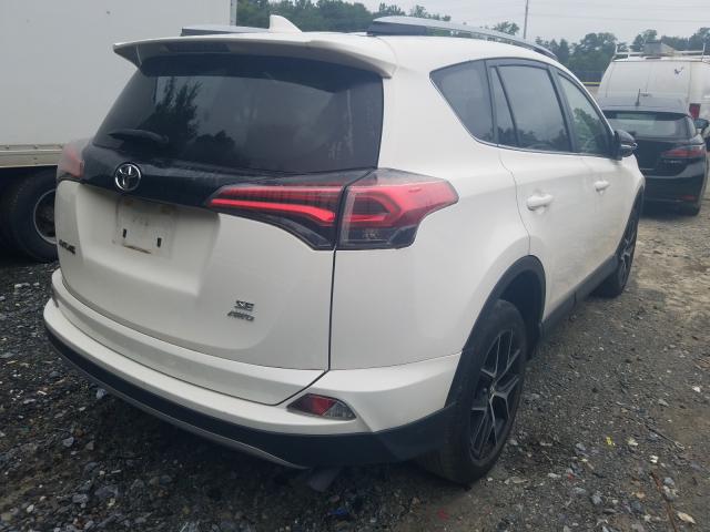 Photo 3 VIN: JTMJFREV4HJ701660 - TOYOTA RAV4 SE 