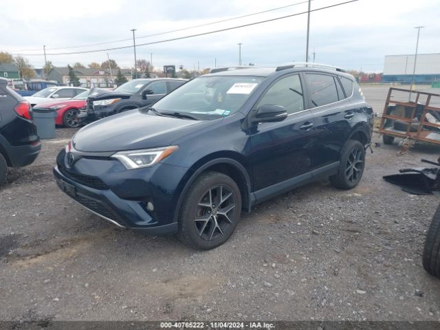 Photo 1 VIN: JTMJFREV6JJ733886 - TOYOTA RAV4 