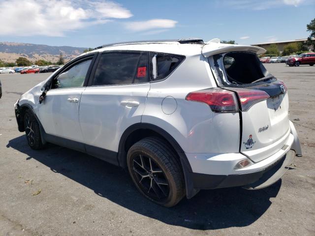 Photo 1 VIN: JTMJFREVXJJ720817 - TOYOTA RAV4 SE 