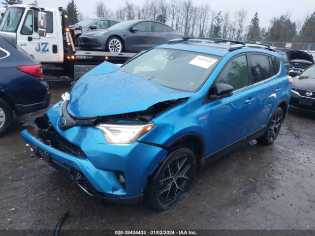 Photo 1 VIN: JTMJJREV3JD164797 - TOYOTA RAV4 HYBRID 