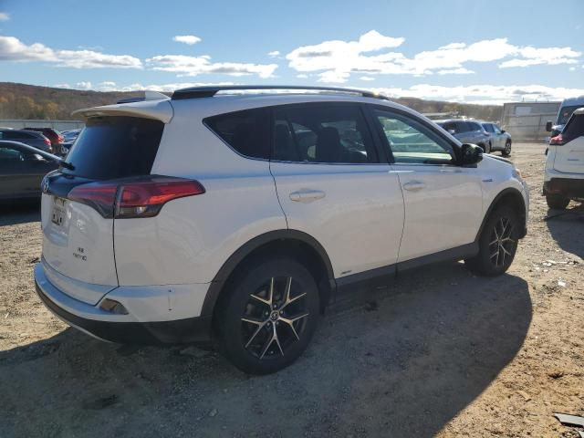 Photo 2 VIN: JTMJJREV5JD188468 - TOYOTA RAV4 HV SE 