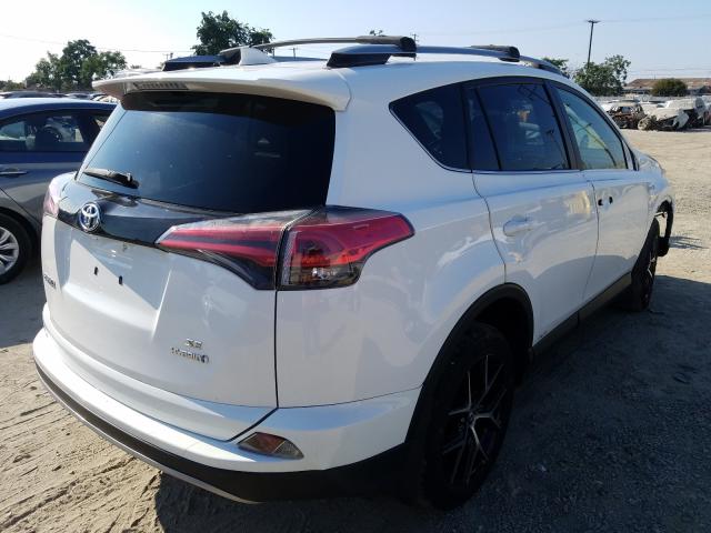 Photo 3 VIN: JTMJJREV7HD115452 - TOYOTA RAV4 HYBRID 