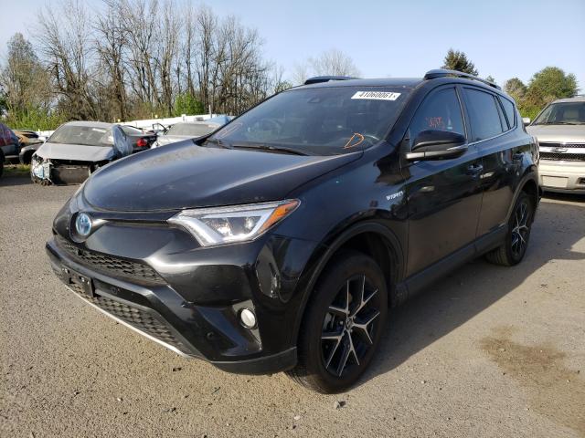 Photo 1 VIN: JTMJJREV7JD244720 - TOYOTA RAV4 HV SE 