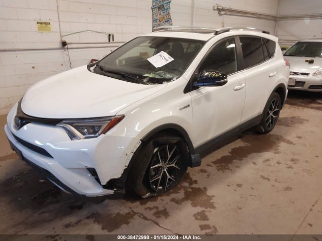 Photo 1 VIN: JTMJJREV8JD222824 - TOYOTA RAV4 HYBRID 