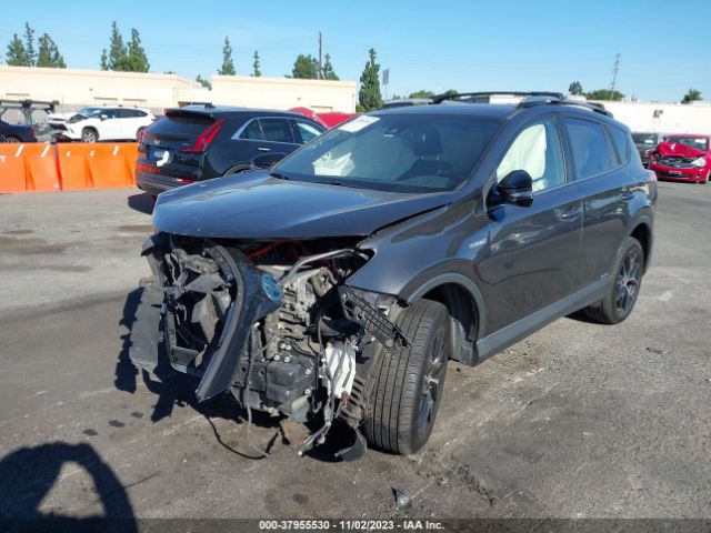 Photo 1 VIN: JTMJJREV9JD165730 - TOYOTA RAV4 HYBRID 