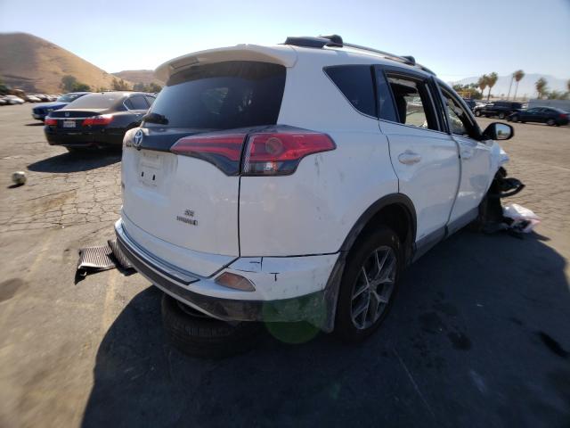 Photo 3 VIN: JTMJJREV9JD229247 - TOYOTA RAV4 HV SE 