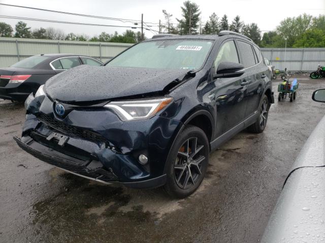 Photo 1 VIN: JTMJJREVXJD187154 - TOYOTA RAV4 HV SE 