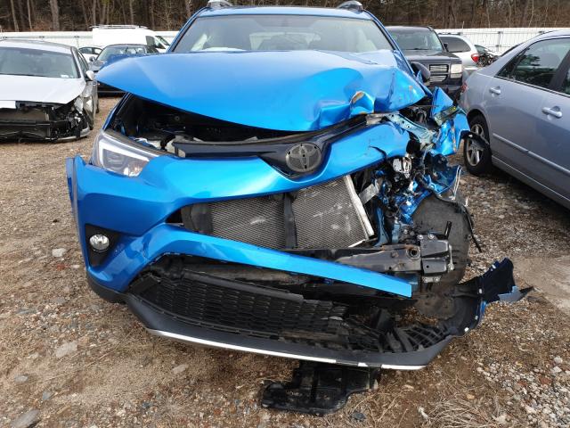 Photo 6 VIN: JTMNFREV2GD087397 - TOYOTA RAV4 SE 