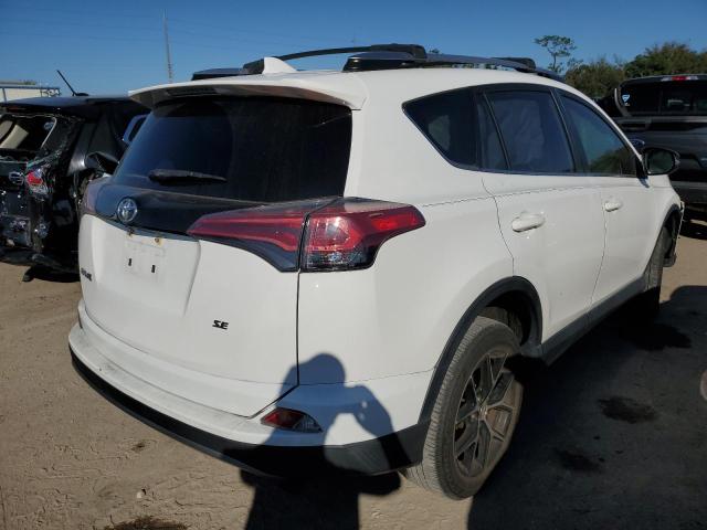 Photo 2 VIN: JTMNFREV4JD128281 - TOYOTA RAV4 SE 