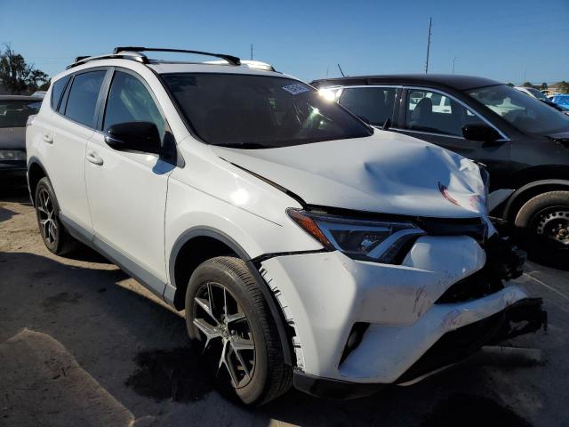 Photo 3 VIN: JTMNFREV4JD128281 - TOYOTA RAV4 SE 