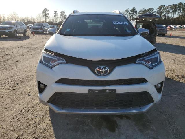 Photo 4 VIN: JTMNFREV5GJ075116 - TOYOTA RAV4 SE 