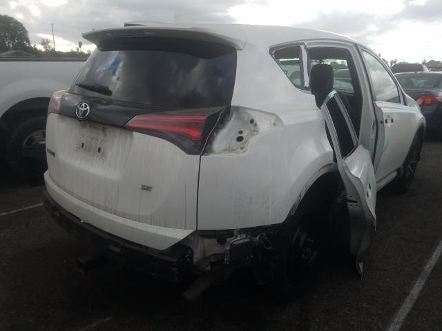 Photo 3 VIN: JTMNFREVXGJ062720 - TOYOTA RAV4 SE 