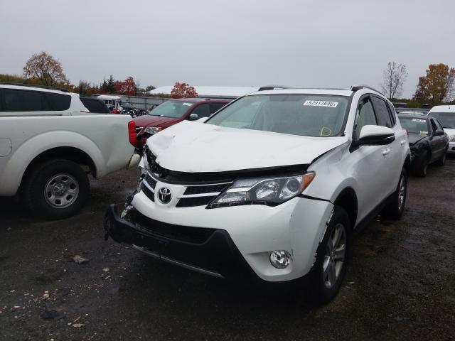 Photo 1 VIN: JTMRFREV0ED090071 - TOYOTA RAV4 