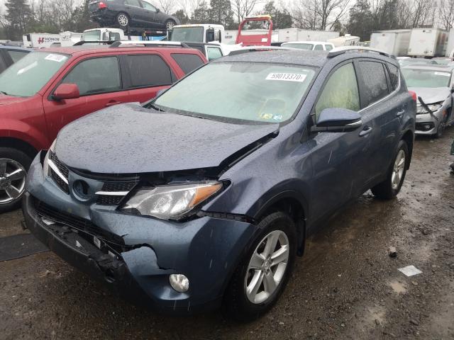 Photo 1 VIN: JTMRFREV0ED090975 - TOYOTA RAV4 XLE 