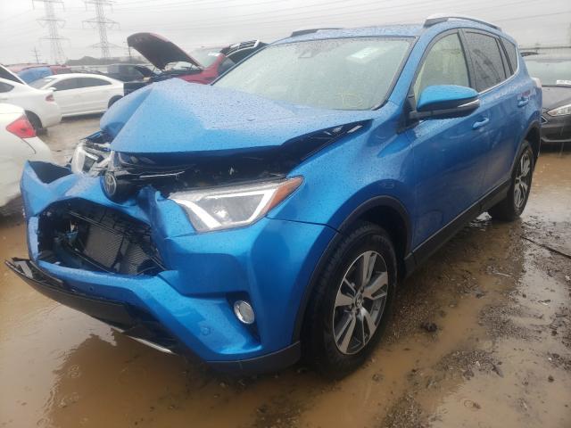 Photo 1 VIN: JTMRFREV0GJ068124 - TOYOTA RAV4 XLE 