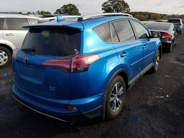 Photo 3 VIN: JTMRFREV0GJ068706 - TOYOTA RAV4 XLE 