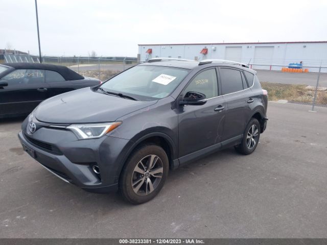 Photo 1 VIN: JTMRFREV0GJ095050 - TOYOTA RAV4 