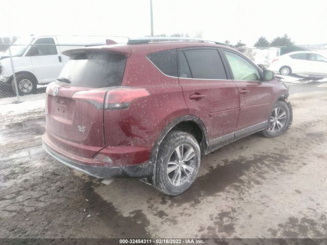 Photo 3 VIN: JTMRFREV0JD254428 - TOYOTA RAV4 