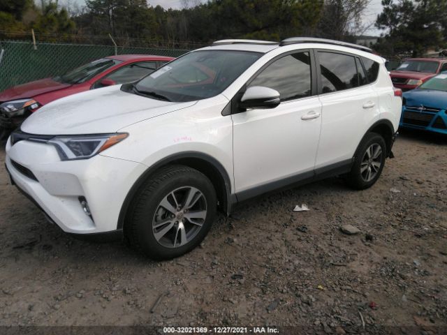 Photo 1 VIN: JTMRFREV0JJ255709 - TOYOTA RAV4 