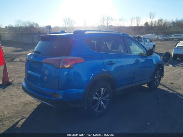 Photo 3 VIN: JTMRFREV0JJ744482 - TOYOTA RAV4 