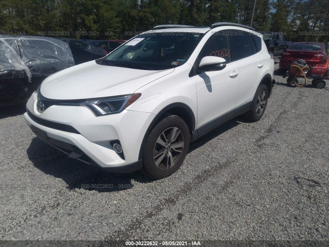 Photo 1 VIN: JTMRFREV2GJ068027 - TOYOTA RAV4 