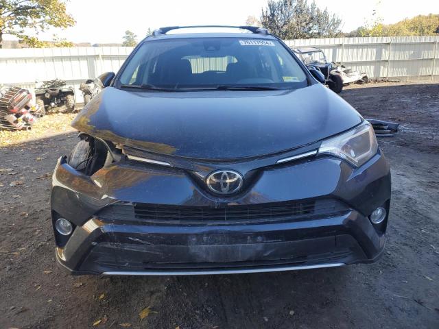 Photo 4 VIN: JTMRFREV2HD217326 - TOYOTA RAV4 XLE 