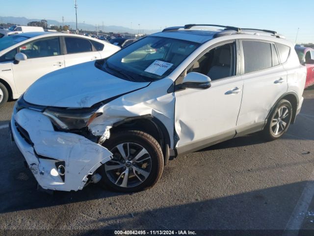 Photo 1 VIN: JTMRFREV2JJ246879 - TOYOTA RAV4 