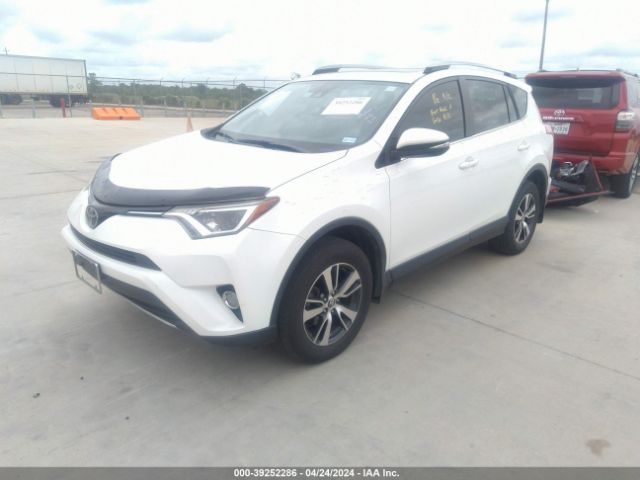 Photo 1 VIN: JTMRFREV2JJ736738 - TOYOTA RAV4 