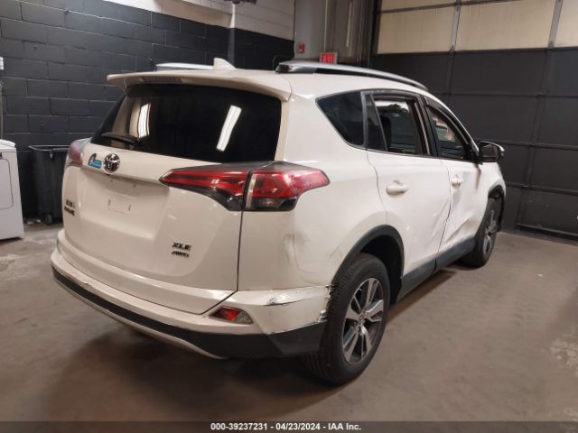 Photo 3 VIN: JTMRFREV3GJ055724 - TOYOTA RAV4 