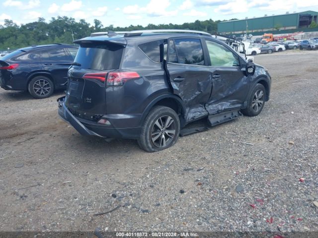 Photo 3 VIN: JTMRFREV3GJ086701 - TOYOTA RAV4 