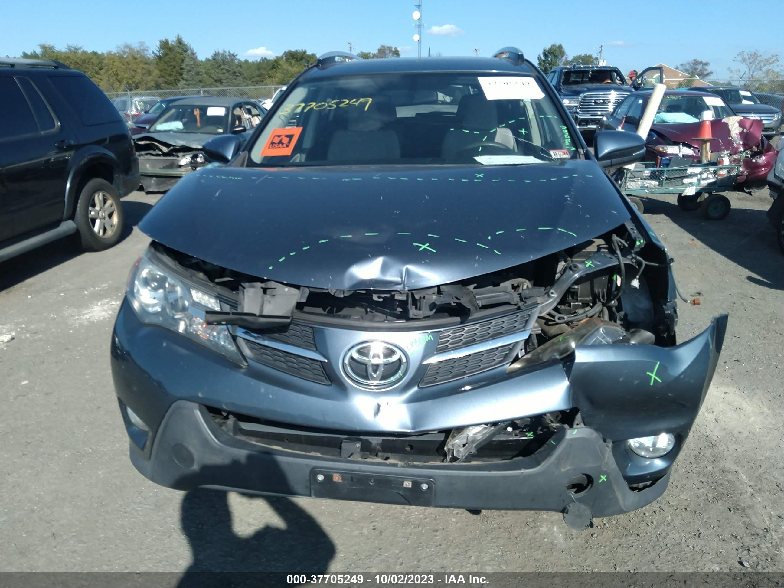 Photo 11 VIN: JTMRFREV4ED072656 - TOYOTA RAV 4 