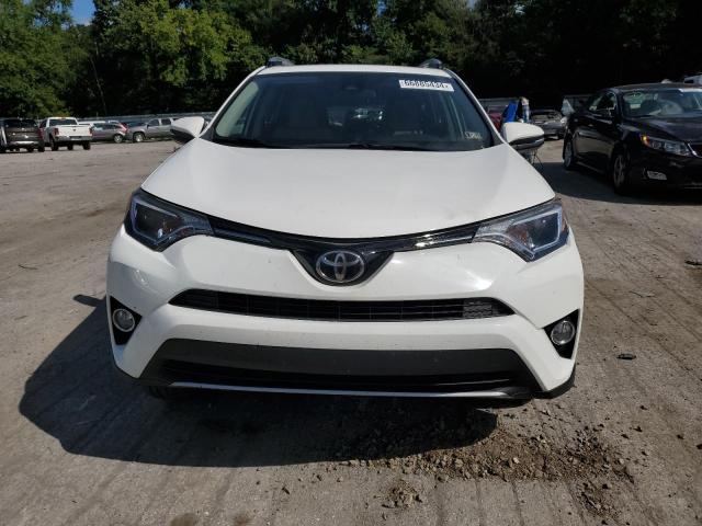 Photo 4 VIN: JTMRFREV5HJ132062 - TOYOTA RAV4 XLE 