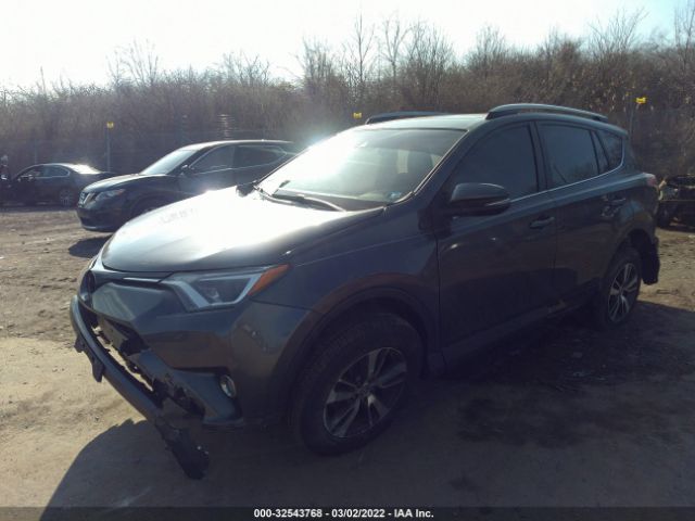 Photo 1 VIN: JTMRFREV6JJ718243 - TOYOTA RAV4 